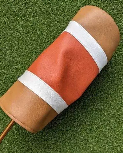 orange and tan striped can head cover